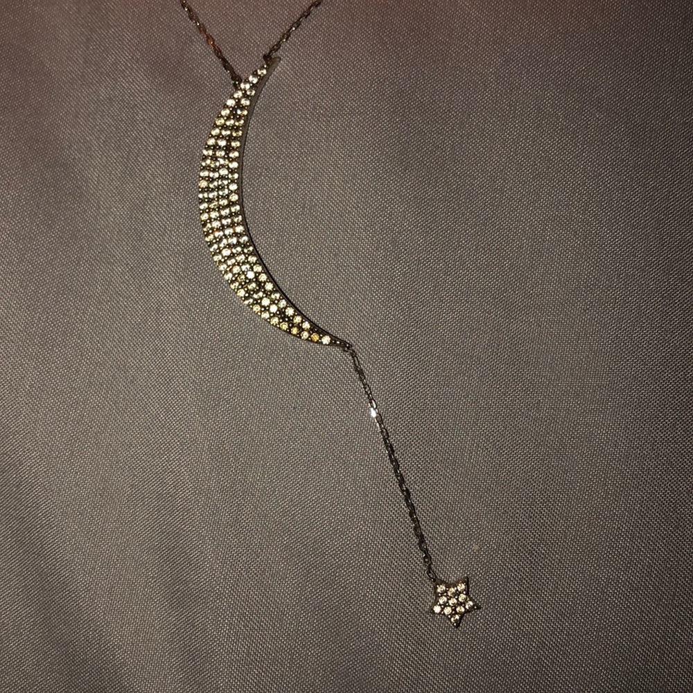 Moon with dangling star